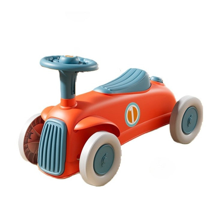 Ride-on autó borulásgátló rendszerrel, kürttel a kormánykeréken, 1-6 éves korig, piros-