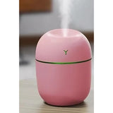 Detaliu buton comandă umidificator roz, 2 moduri vaporizare persistentă și intermitentă