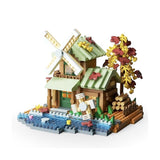 Set construcție Flippy Forest Log Cabin, 717 piese ABS, model căsuță cu moară de vânt, vedere frontală, multicolor