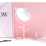 Oglina Cosmetica cu Picior, Vivimall, HD, Rotire 360 Grade, 15 cm Diametru, Suport Bijuterii Baza Rotunda + 2 Brate, Model cu Urechi, 31 x 14.5 x 15 cm, din Plastic, Roz/Alb - vivimall.ro