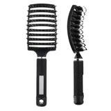 Detaliu peri mistreț și nylon cu vârf rotunjit ai periei Flippy Wet & Dry, efect masaj scalp
