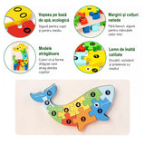 Cele 11 piese ale puzzle-ului lemn Flippy model Balenă, aranjate separat pe fundal alb