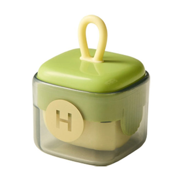 Rolă pentru scame lavabilă în formă de cub din plastic verde matcha, vedere frontală, dimensiuni 6x4,3 cm
