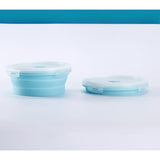 Set 2 caserole rotunde pliabile Vivimall, din silicon, rezistenta la temperaturi ridicate, usor de depozitat si curatat, 500 si 800 ml, utilizare in cuptorul cu microunde, albastra - vivimall.ro