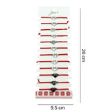 Set complet 12 brățări mărțișor Jolie aranjate decorativ, șnur roșu și pandantiv argintiu, prezentare cadou