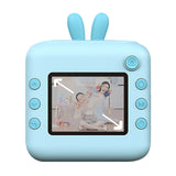 Set Camera Instantanee pentru Copii, Flippy, Ecran HD 2.4'', 24MP, 720P Video, 1200 mAh, cu Functie de Printare Alb-Negru, cablu USB-C, Bluetooth, Compatibil iOS/Android, Imprimare APP, Model Iepure, Albastru - vivimall.ro