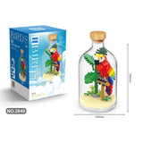 Detaliu piese plastic multicolor din setul de construit în sticlă Vivimall model Papagal, 483 componente
