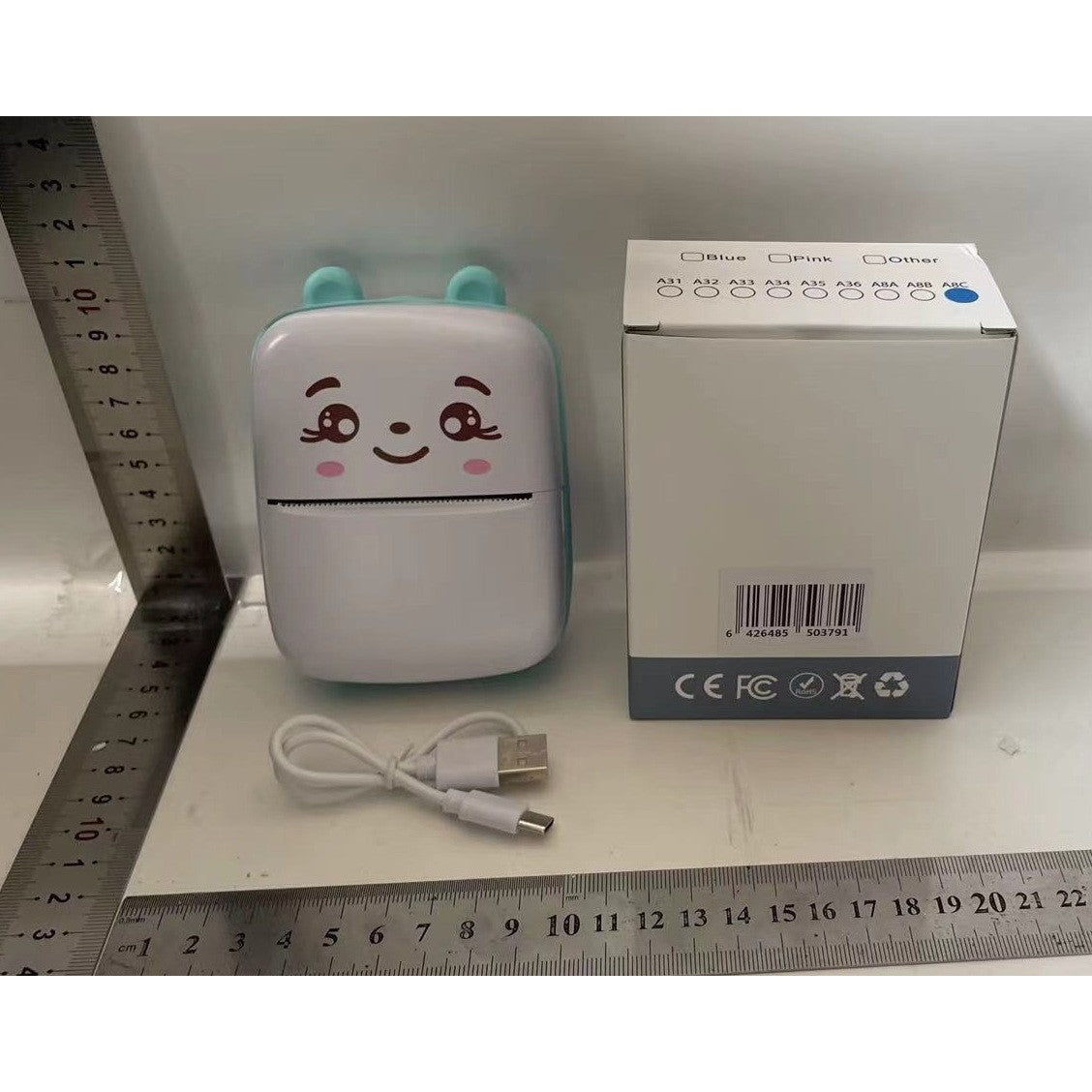 Set Mini Imprimanta Foto Portabila, Vivimall, Include: 1x Set de Markere, 5x Role de Hartie Termica, 5x Role Hartie Adeziva, Incarcare USB, Bluetooth, Print Alb-Negru, Model Ursulet, Alb/Albastru - vivimall.ro