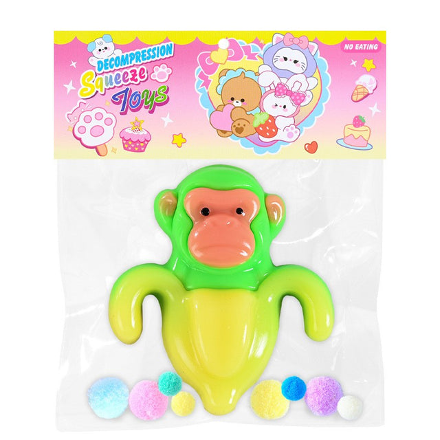 Jucărie antistres Squishy Flippy Banana Monkey din TPR, culoare galben și verde, vedere frontală în ambalaj transparent