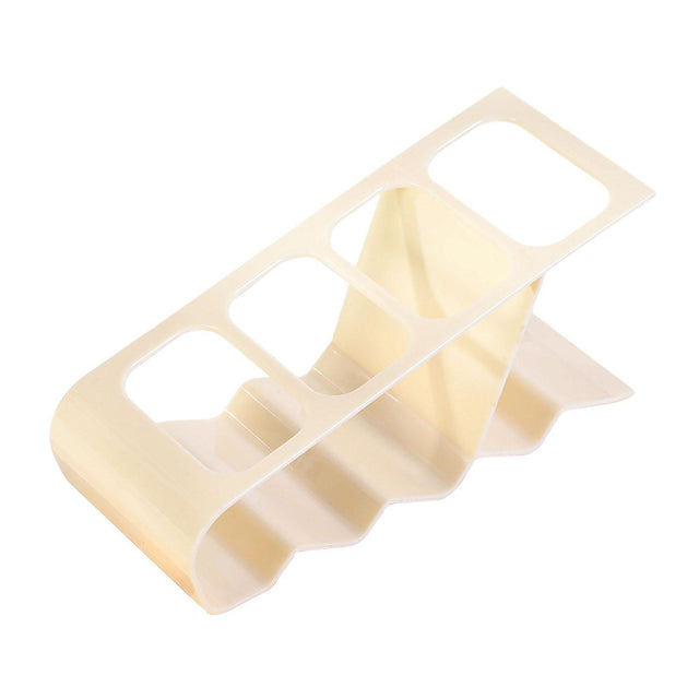 Suport de birou alb din plastic cu 4 compartimente pentru telecomenzi și telefoane, vedere frontală, dimensiuni 18x7x9 cm