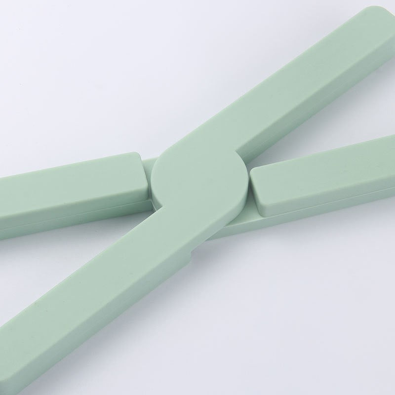 Suport pliabil din silicon pentru vase fierbinti Vivimall, portabil, usor de depozitat, rezistent la temperaturi foarte ridicate, 14.5 x 7.5 x 1.6 cm, antialunecare, verde - vivimall.ro