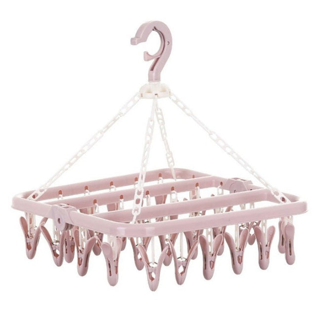 Uscator de rufe Vivimall, 32 de cleme, Plastic, Pliabil, rotire 360 grade, 32x32 cm, Roz - vivimall.ro