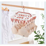 Uscator de Rufe Suspendat Vivimall, cu 40 Carlige, Rotire 360 Grade, Protectie Vant, Pliabil, Patrat, Mateiral Plastic, Usor de Depozitat, Multifunctional, 36 x 24 cm, Alb/Roz - vivimall.ro